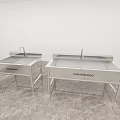White Interior Room Featuring Four Stainless Steel Sinks On Marble Floor