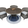 Round Wicker Table and Chair Set with Three Chairs White Cushions and Blue White Rug