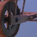Two Blue Striped Wooden Barrels On Wooden Cart With Red Cross Marks And Wheels