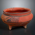 Artistic Red Three Legged Pottery Sculpture With Black Carved Decorative Patterns