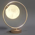 Modern Table Lamp with Circular Golden Frame and Moon Shaped Illuminated Globe on Brown Base
