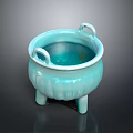 Light Blue Ceramic Furniture Piece With Two Handles Three Legs And Textured Surface