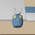 Blue Kids Electric Toothbrush With Cute Animal Design Yellow Eyes And White U Shaped Head