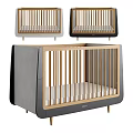 Modern Stylish Baby Crib With Gray Black Wooden Rails And Sleek Design