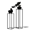 Stylish Bonsai Potted Plants Displayed On Two Tall Metal Pedestals