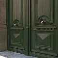 Green Double Doors With Ornate Carved Panels And Stone Arch Frame