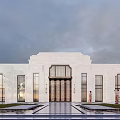 White Symmetrical Building With Grand Entrance Glass Windows And Lawn Water Pool