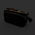 Black Box Bag Featuring Metallic Hardware Red Accent And Tassel Detail Design