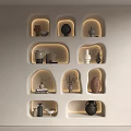Modern Built-In Wall Display Shelves With Ceramic Vases And Warm Lighting For Home Decor