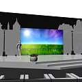 Blue Illuminated Stage Setup With Colorful Background Screen And Arranged Audience Seats