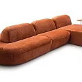 Orange L shaped Sectional Sofa With Plush Velvet Upholstery And Small Side Table