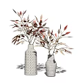Two white patterned vases with red and beige branches in minimalist home setting