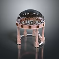 Ornate Outdoor Structure Featuring Pink Columns Black Filigree Dome And Decorative Bases