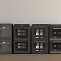 Black Kitchen Appliances with Transparent Doors Side by Side Featuring Interior Racks and Dishes