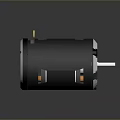Black Cylindrical Electric Motor With White Shaft And Yellow Terminals