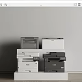 Office Appliances Display Various Canon Printers in Different Colors on White Shelf