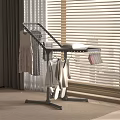 Sturdy Modern Clothes Rack With Hanging Clothes Near Window Blinds And Curtains On Carpet