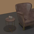 Brown Leather Single Sofa with Gold Legs Stitching Details and Small Round Side Table