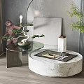 Round Coffee Table With Marble Glass Top Monkey Statue And Potted Plant Vase