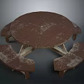 Round Wooden Outdoor Picnic Table With Attached Benches And Weathered Surface