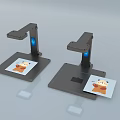 Two Black Commercial Overhead Scanners with Adjustable Arms and Base for Card Scanning