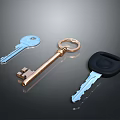 Set of Three Different Keys Including Blue Golden and Black Handled on Dark Surface