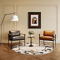 Black and Brown Leather Leisure Chairs With Small Round Table Vase Flowers in Modern Interior