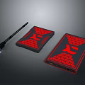 Portable External Hard Drive With Red Geometric Pattern And USB Cable For Computer Data Storage