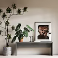 Minimalist Entryway Console Table With Tall Green Plants And Framed Painting Decor