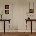 Elegant Dark Wood Console Table With Green Vase Flowers Branches And Framed Paintings
