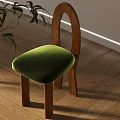 Modern Leisure Chair With Wooden Arch Backrest And Green Velvet Seat On Wooden Floor