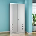 Silver Double Door Storage Cabinet In Light Blue Room With Green Plant And Blinds