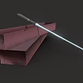 Red Long Box With Black Handle And Silver Rod On Dark Background