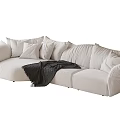 Modern White Sectional Sofa with Plush Pillows and Cozy Blanket for Comfortable Living Room
