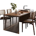 Modern Wooden Dining Table Set With Four Rattan Back Chairs Decorative Vase And Green Plant