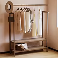 Minimalist Clothing Rack With Hanging Dresses Hat And Shelf Items Near Window