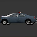 White Police Car And Blue Sedan Toy Models On Reflective Surface