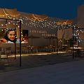 Cozy Night Seafood Barbecue Restaurant With Warm String Lights And Comfortable Outdoor Dining Spaces