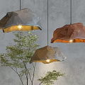 Natural Style Stone Shaped Pendant Lights With Small Tree Decoration And Grey Wall Background