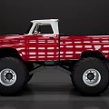 Red Vintage Modified Truck With Large Monster Tires And White Roof