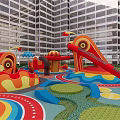 Vibrant Children's Play Area With Slides Round Tables Colorful Flooring And Tall Building Background