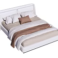 Double Bed with White Headboard Beige Sheets Brown Pillow and Blanket