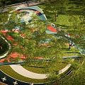 Colorful Children's Play Area Design With Green Lawn Trees And Curved Paths