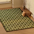 Square Green And White Checkered Rug On Wooden Floor With Small Table Vase And Cushion