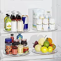 Organized Refrigerator Interior With Glass Shelves Holding Drinks Milk Jams And Fresh Fruits