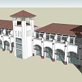 Modern Commercial Street With White Buildings Red Roofs Arched Storefronts And Towers