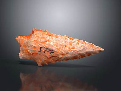 Orange Stone Arrowhead Artifact With Engraved Number 574 And Textured Surface 3d model