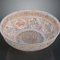 Intricately Carved Decorative Bowl With Colorful Figure Patterns And Detailed Designs