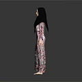 Woman in Floral Dress and Black Hijab Standing Against Gray Background