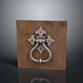 Decorative Metal Door Knocker On Rustic Wooden Panel With Intricate Design